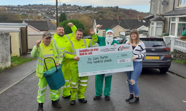 Santa seen delivering £500 cheque to food waste recycler in Caerphilly
